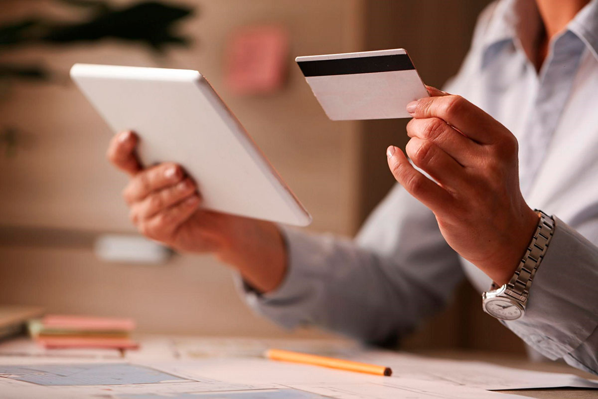 Girl holding a credit card